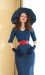 Front view of Annalai in dress with red belt and wearing hat and gloves